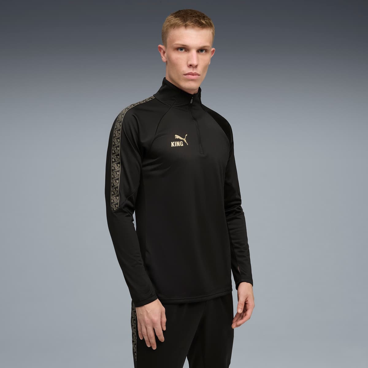 PUMA KINGtouch voetbaltop met kwartrits voor Heren, Zwart/Goud, Maat 3XL